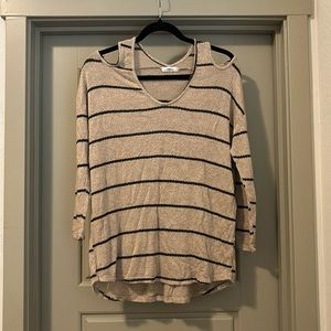 Women’s light weight sweater with open shoulder sleeves. Size S